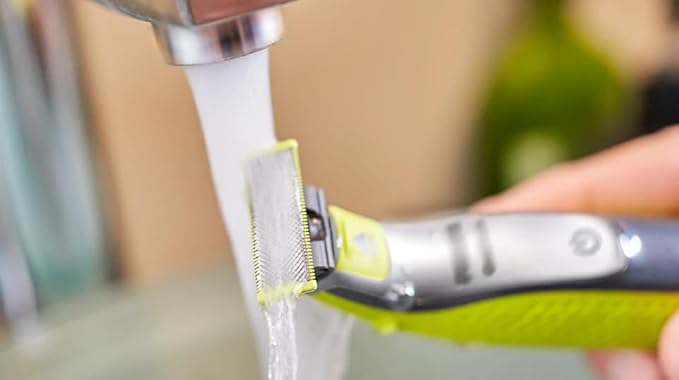 Philips OneBlade Hybrid Body and Face Stubble Trimmer with 4 x Lengths, 2 Extra Blade and Travel Pouch,