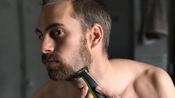 Philips OneBlade Hybrid Body and Face Stubble Trimmer with 4 x Lengths, 2 Extra Blade and Travel Pouch,